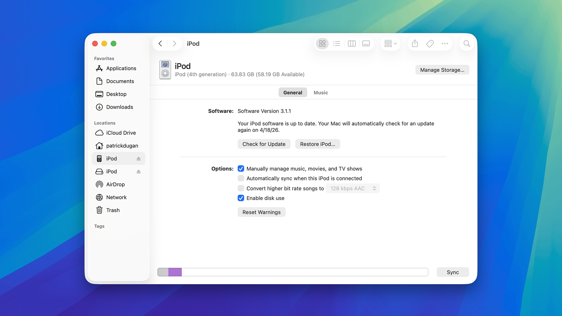 macOS Finder window titled iPod, with the device listed in the Locations sidebar. The General tab is selected, showing the iPod's name, generation, capacity (83.62 GB of 58.19 GB available), software version 3.1.1, sync options, and a progress bar at the bottom showing an active sync.