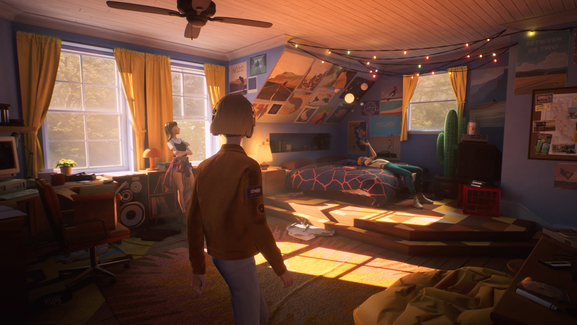 An in-game screenshot from Mixtape. The protagonist in a brown jacket stands in a 90s teenage bedroom at sunset. Two friends linger in the background, one near the window and one lounging on a lava-print bedspread. The room is lit by sunlight through curtains and decorated with fairy lights, posters, a vintage CRT computer, and a boombox.